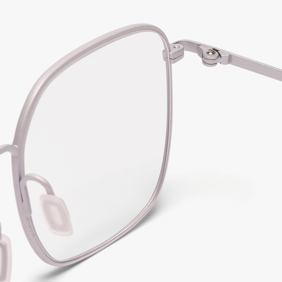 Close-up of Båstad Steel glasses with a sleek metal frame