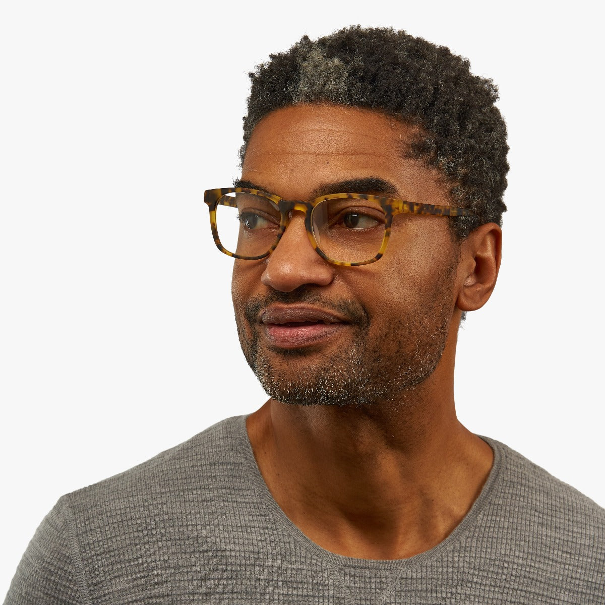 Person wearing Bornholm Light Turtle glasses with tortoiseshell frames