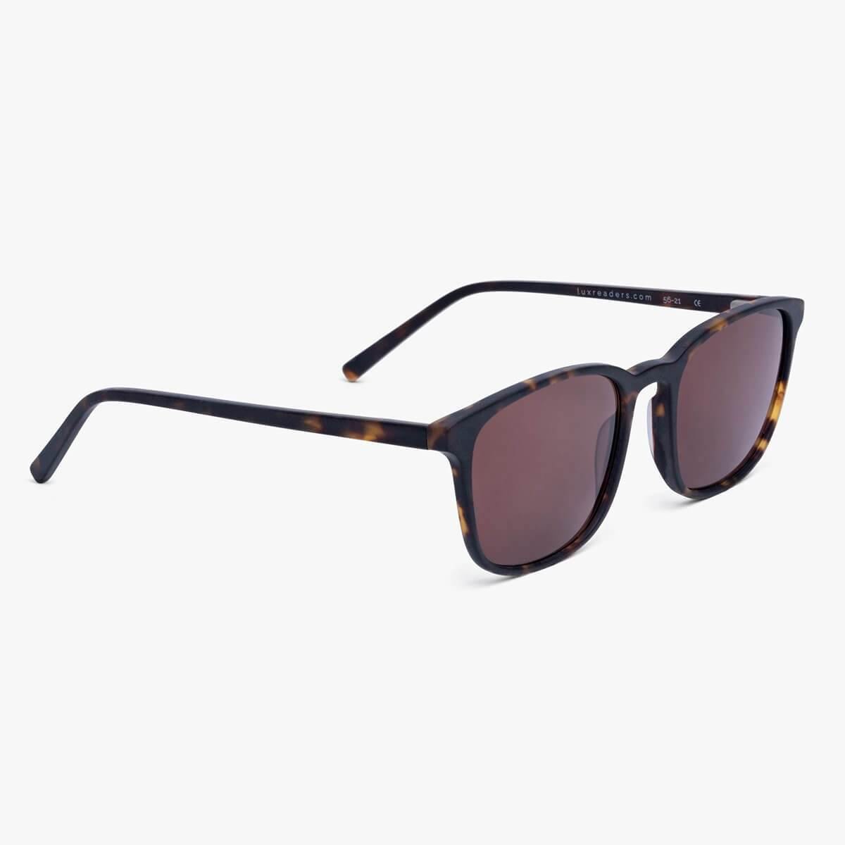 Ebeltoft Dark Turtle glasses with a tortoise shell pattern and dark lenses