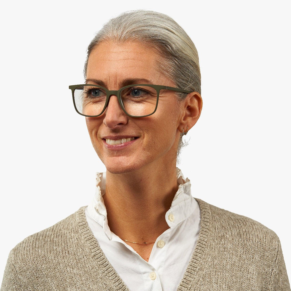 Person wearing Fyn Dark Army glasses with green frames