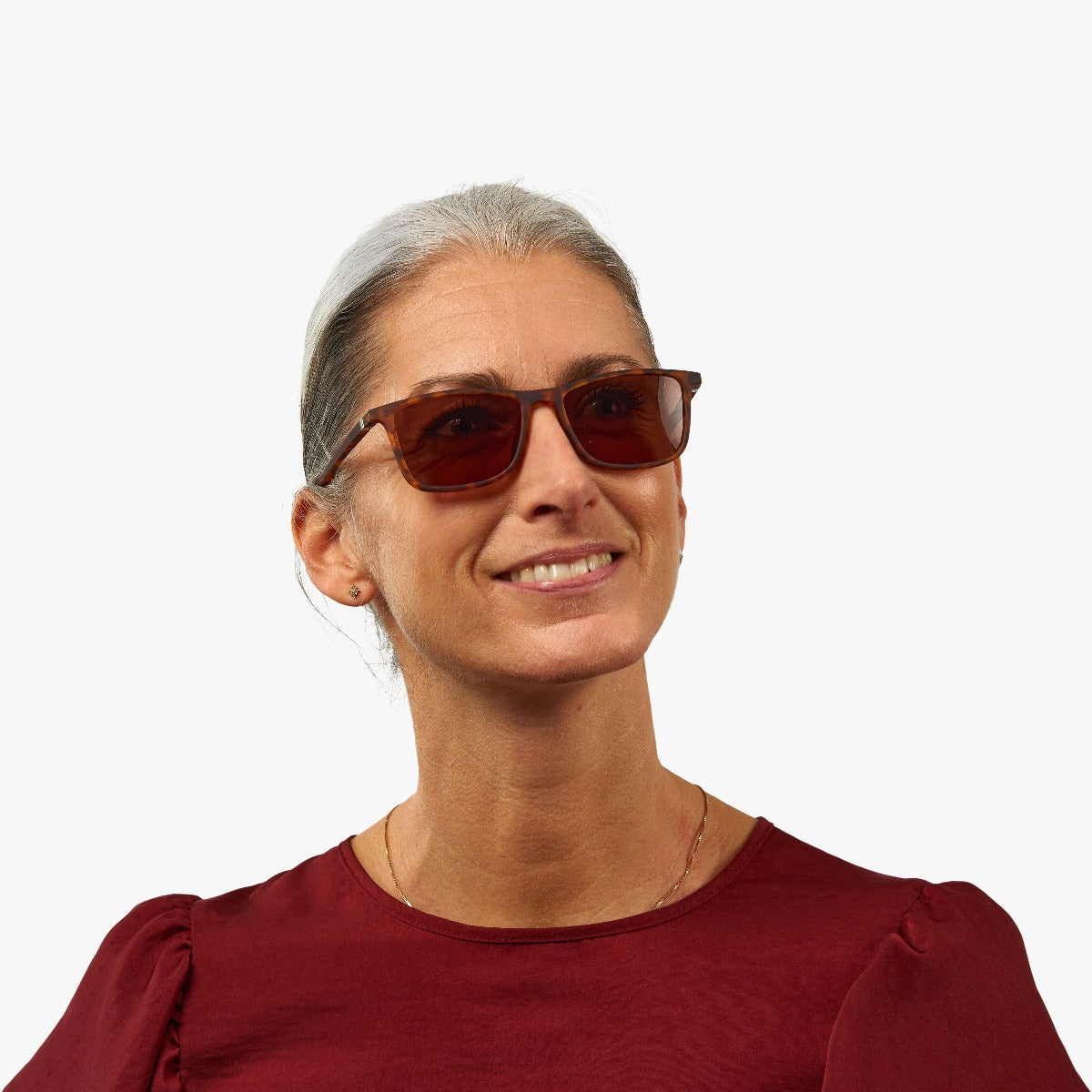 Person wearing rectangular turtle sunglasses