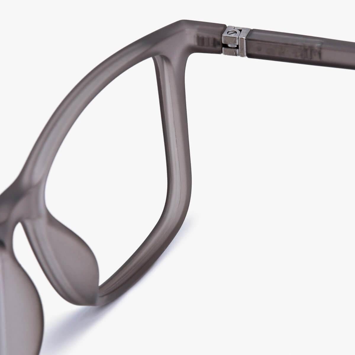 Close-up of Skagen Grey glasses with matte finish and metal hinge