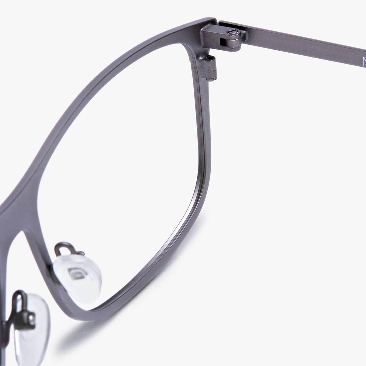 Close-up of Møn Gun glasses with metallic gray finish and clear nose pads