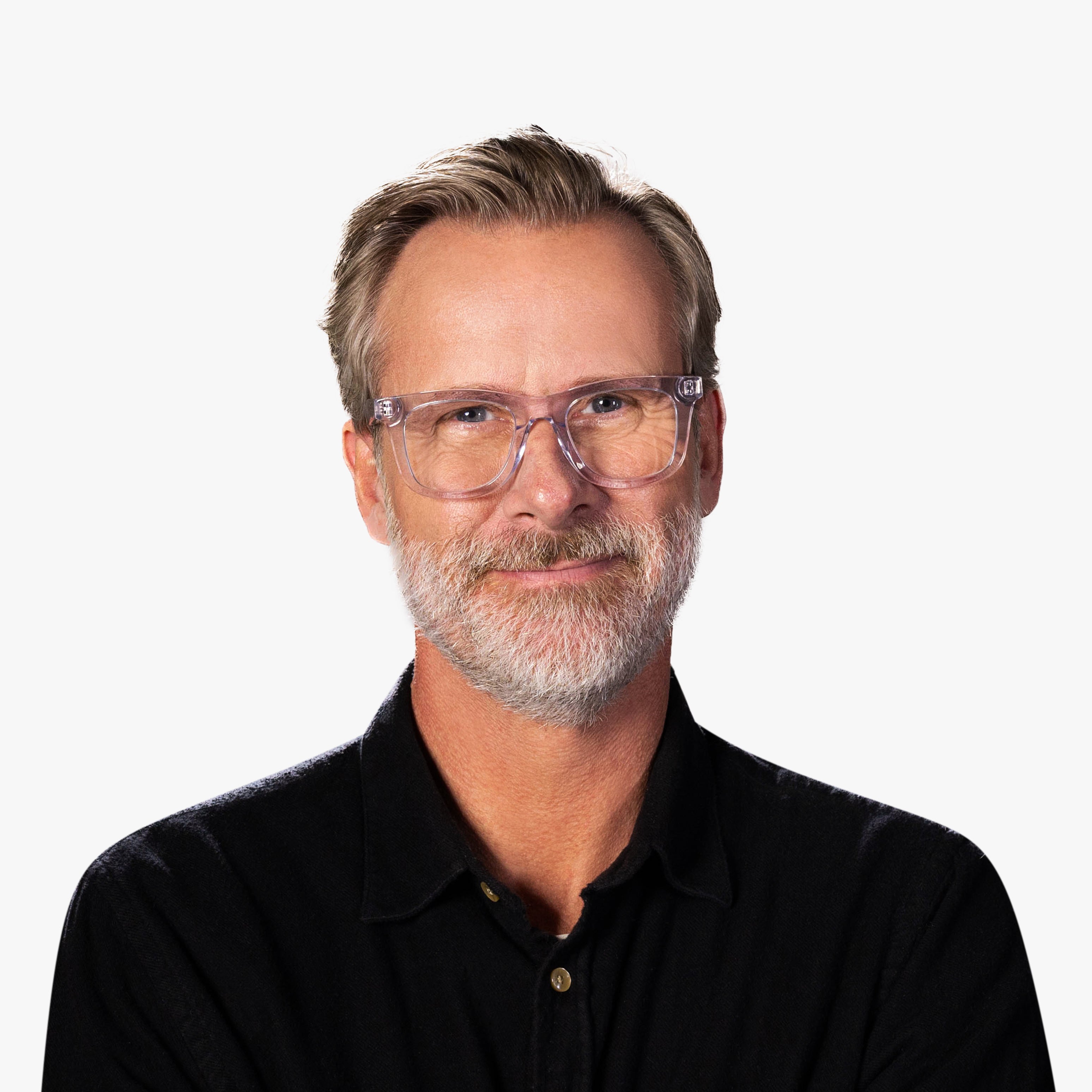 Person wearing Samsø Crystal White reading glasses