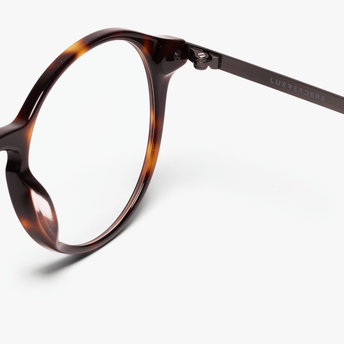 Tortoiseshell round reading glasses with Luxreaders branding on the temple