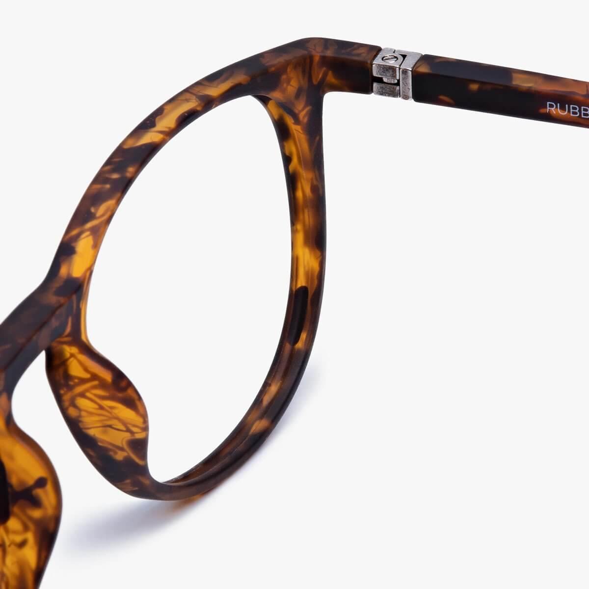 Tortoise shell reading glasses with round frame and silver hinge detail