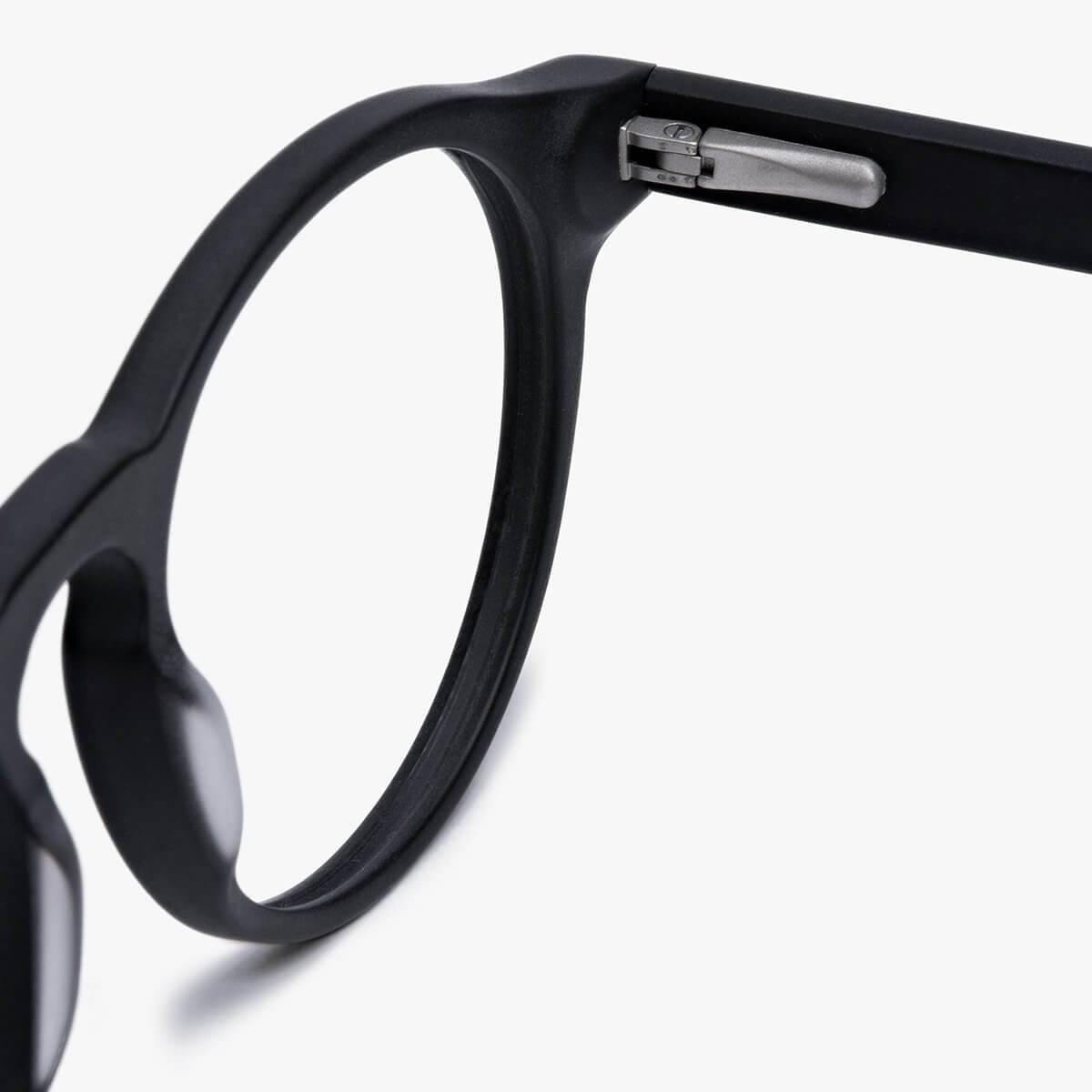 Close-up of black Trondheim glasses hinge and frame